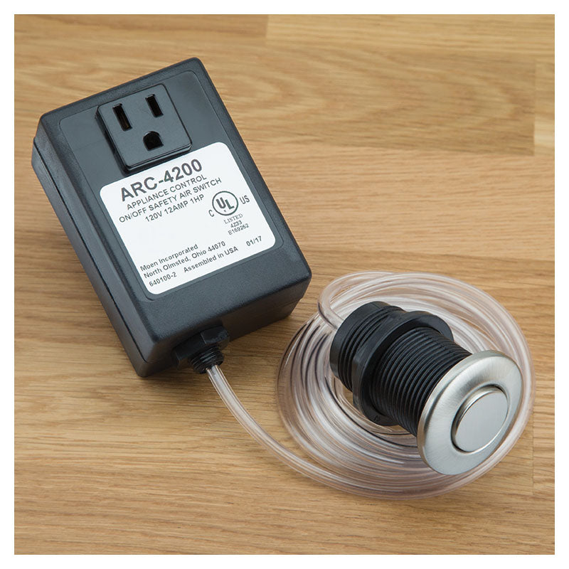 Botón interruptor para triturador de alimentos Moen