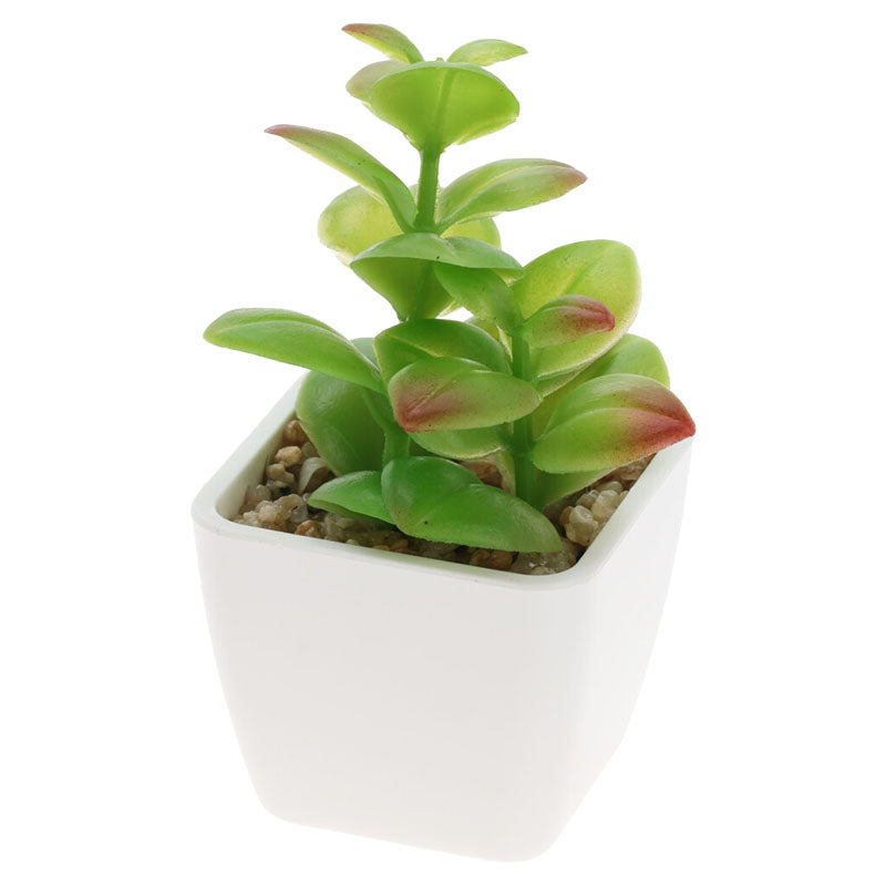 Planta artificial en maceta pequeña