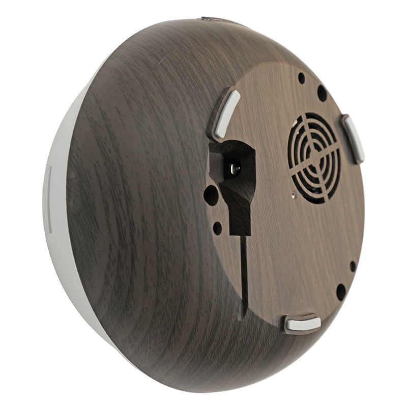 Difusor de aromas ultrasónico plástico con acabado efecto madera en color café con conexión por adaptador eléctrico con iluminación LED ambiental